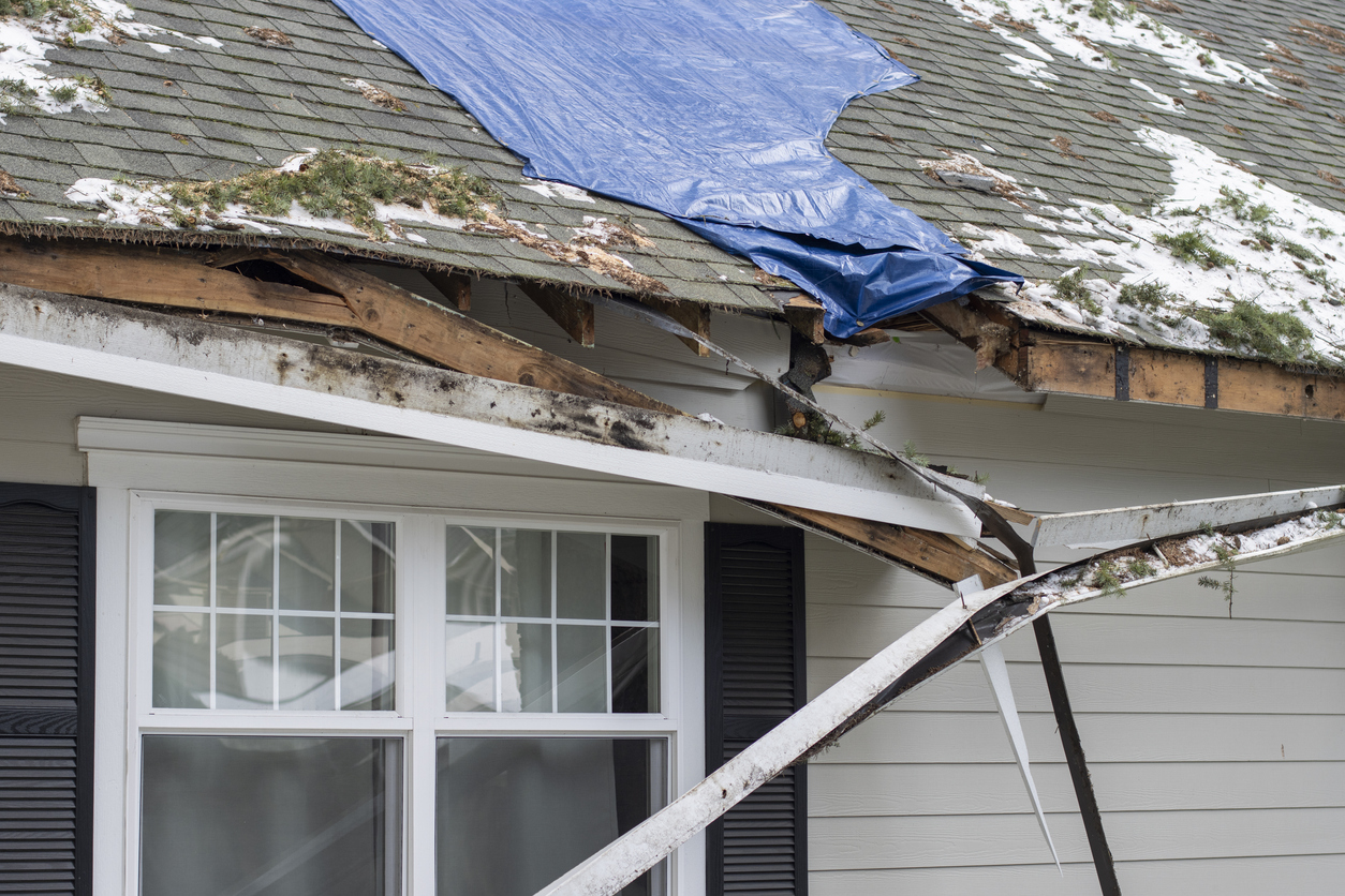 Wind damage repair and restoration in progress