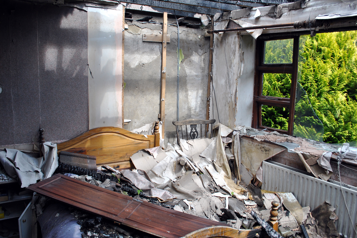 Fire damaged home interior requiring professional restoration