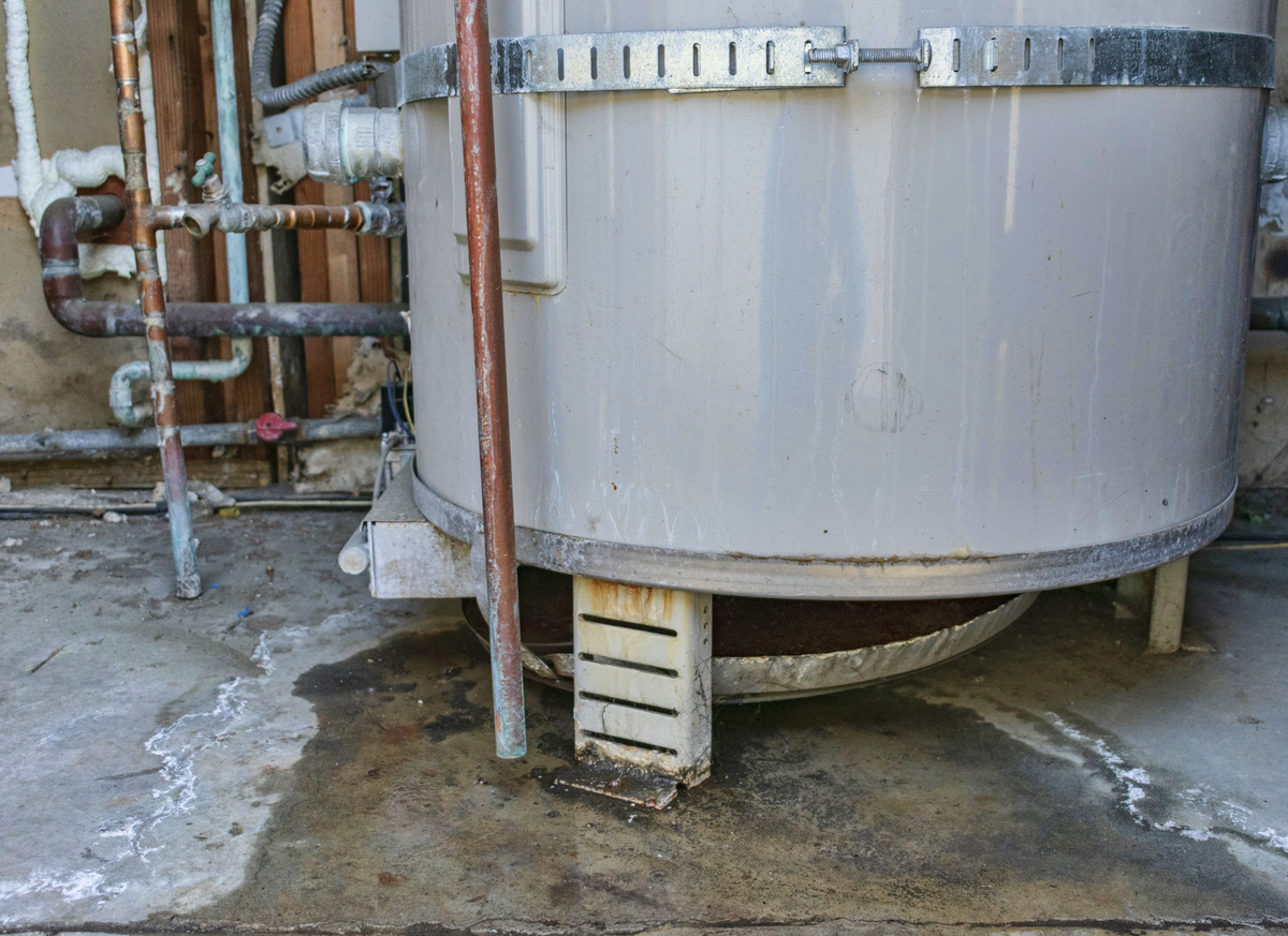 Water heater leak in basement causing water damage